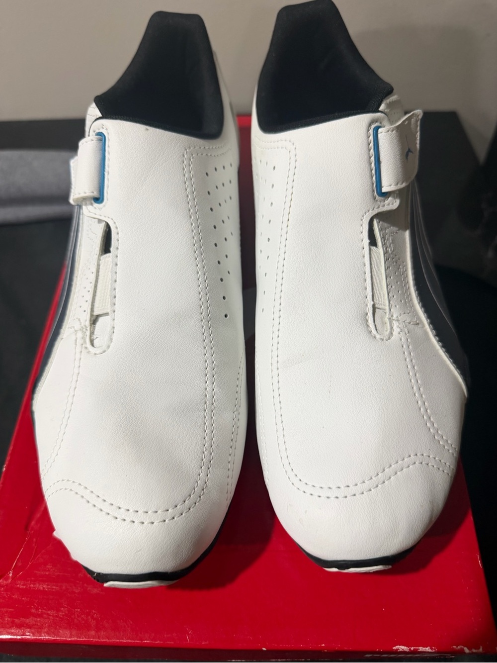 Puma White Slip-On Athletic Sneakers with Black Collar and Blue Accent